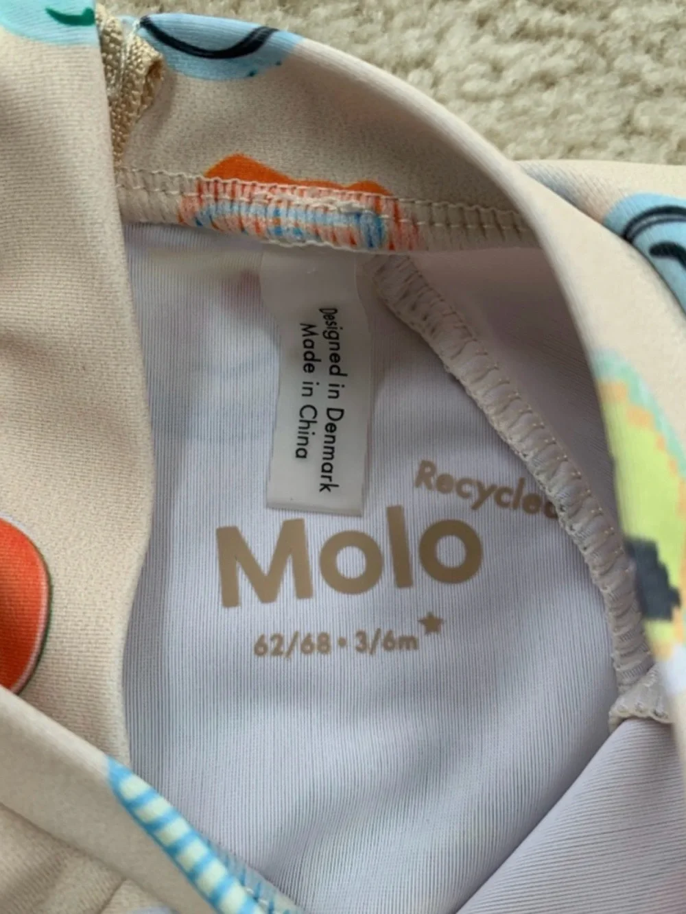 Molo Beige Swimsuit with Orange, Blue and Green Accents